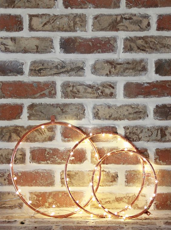 copper wreaths with lights for industrial decor