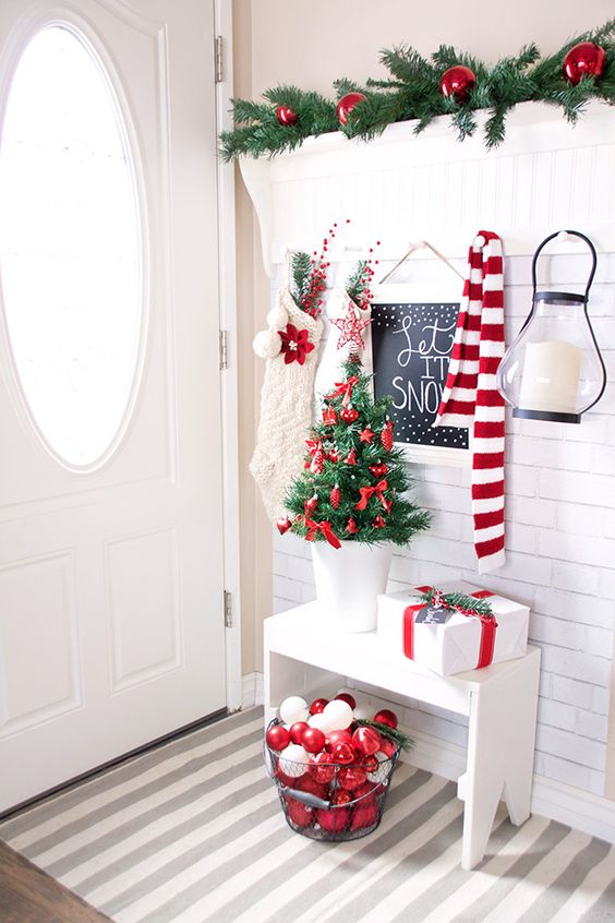 Red and White Christmas hallway decorations - The Belle Blog