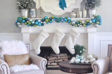 28 white stockings, an ornament garlands of various shades of blue and green