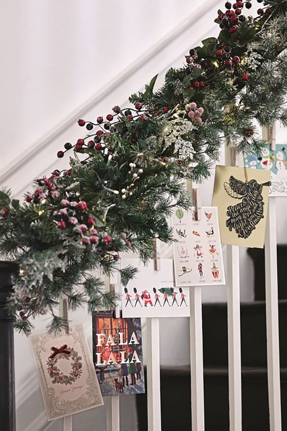 attach your cards on clothes pins to the railing