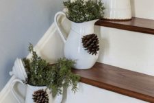 31 fresh juniper in vintage enamelware placed right on the stairs
