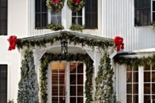 35 evergreen garland, trees and wreath with red bows
