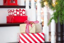 35 place gift boxes right on the stairs to bring a holiday vibe