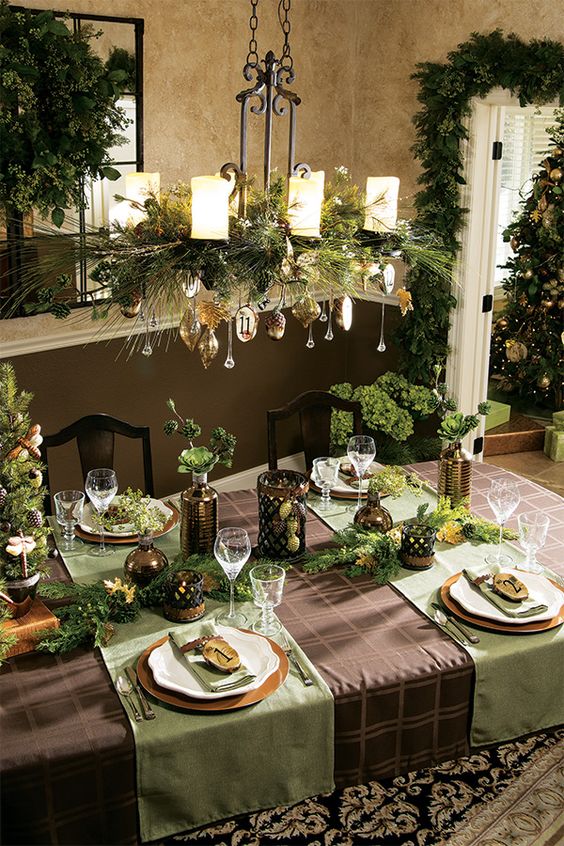 greenery and gold ornaments for a candle chandelier