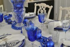 36 royal blue beads, ornaments and chargers for table decor