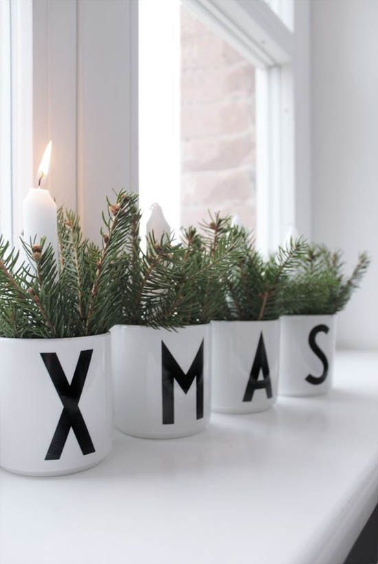 XMAS pots with fir branches and candles