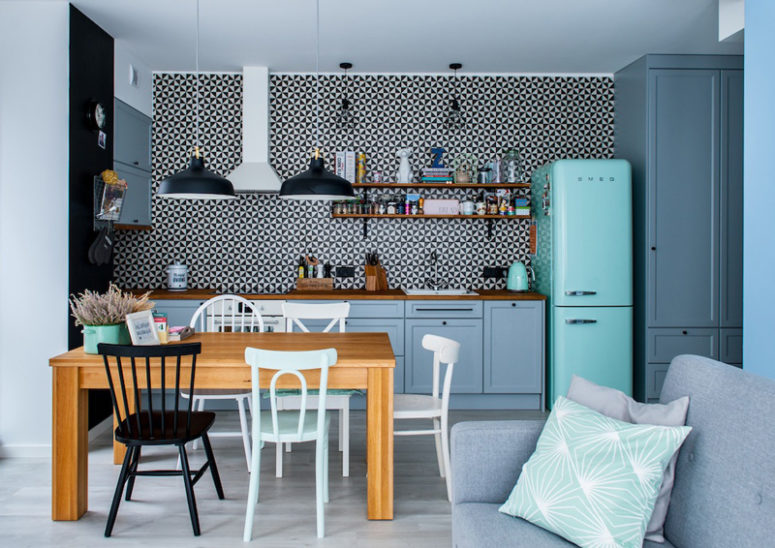 tile kitchen backsplash The kitchen has a fantastic graphic tile wall that stands out in the backdrop of pale blue cabinets