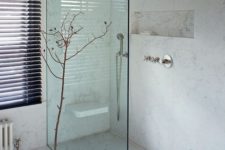 02 chic modern shower that seems one space with the bathroom