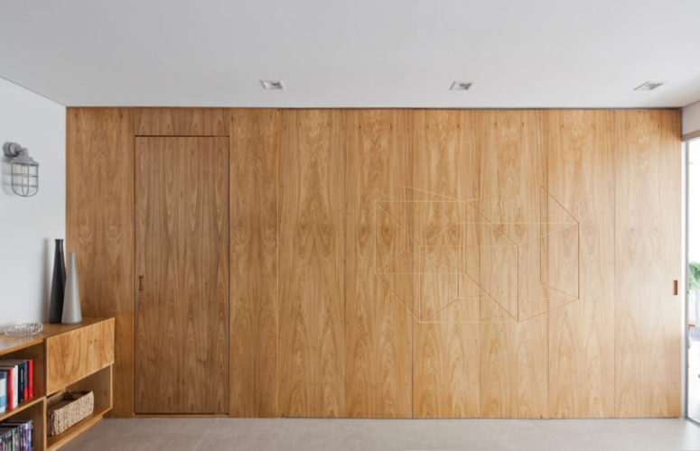 geometric room divider When the panel is closed, the private areas are hidden, and the panel greets with cool geo design