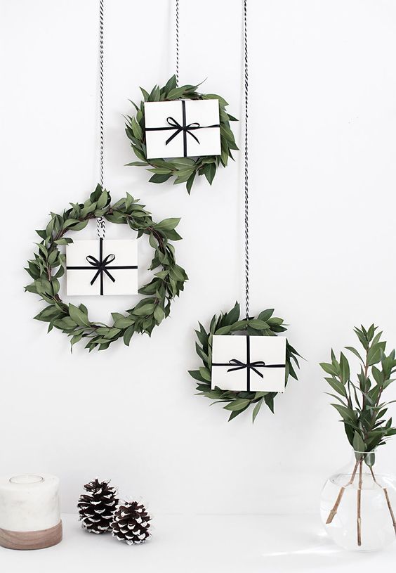 leafy wreaths with gift boxes inside for a modern look