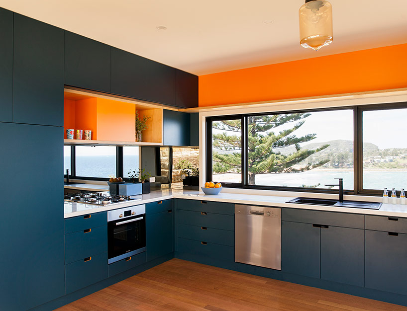 The interior is done in a mix of earthy, even orange tones and blues
