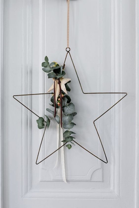 star-shaped wreath with eucalyptus is a cool and contemporary idea