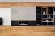 06 A built-in fireplace makes the decor even more welcoming, warm and comfortable
