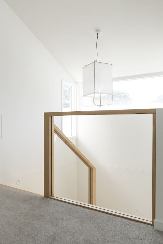 wooden handrails with a glass balustrade