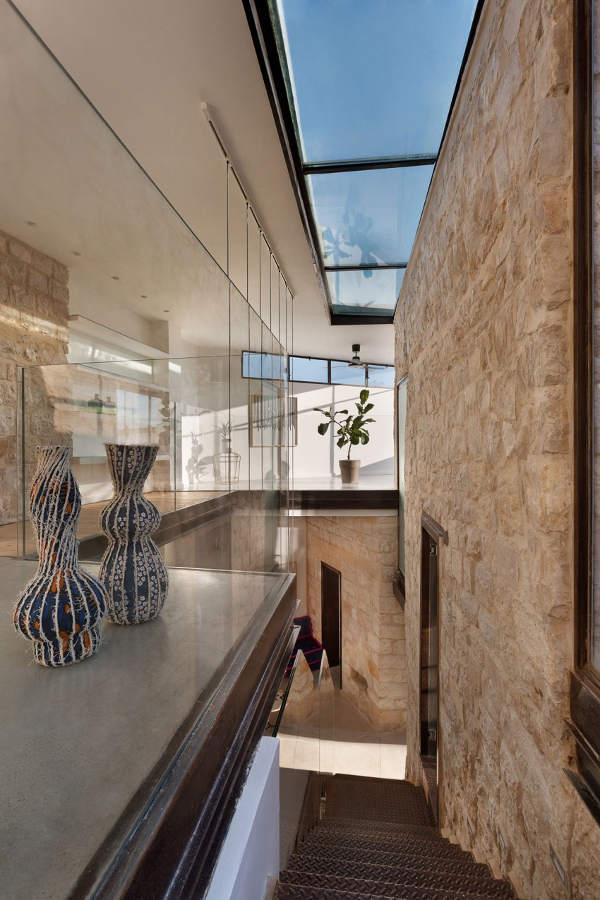 There are skylights to let more light in because otherwise a stone house may look too gloomy