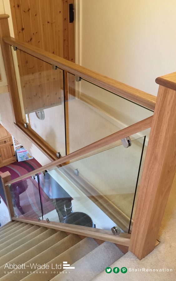 wooden handrail with a glass balustrade
