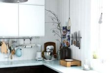 08 modern farmhouse kitchen with tiles continuing from the walls to countertops