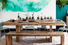 09 reclaimed wooden table and benches contrast with modern watercolor wall art