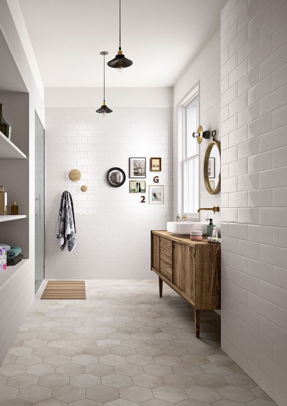 neutral hex tiles on the floors and white subway tiles