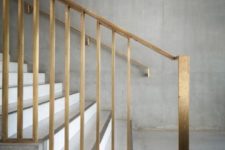 12 gold metallic banister on a concrete staircase look modern and chic