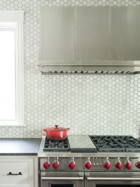 marble hex tile backsplash looks cool with stainless steel surfaces