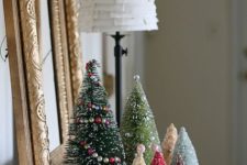 16 small bottle brush trees with tiny ornaments