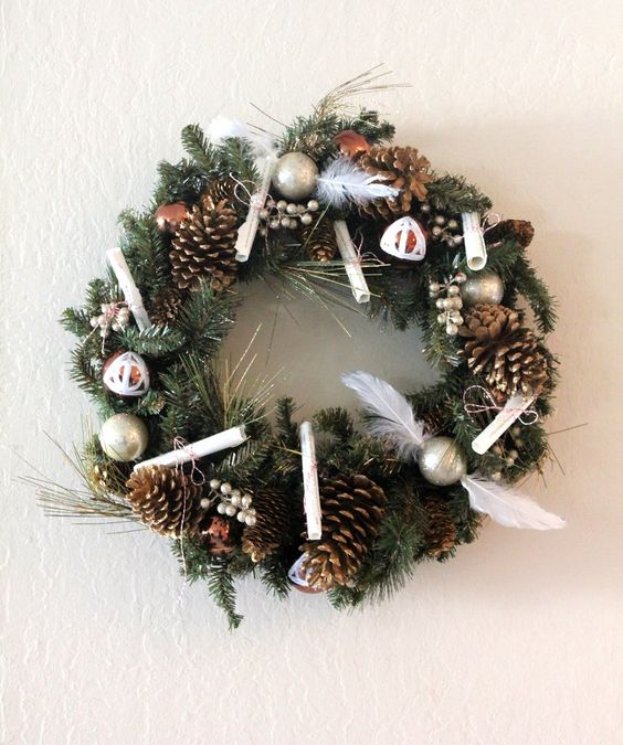 Harry Potter wreath with snitches and pinecones