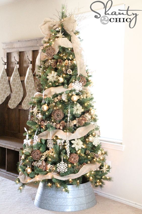burlap, vine spheres and pinecones for a chic rustic tree