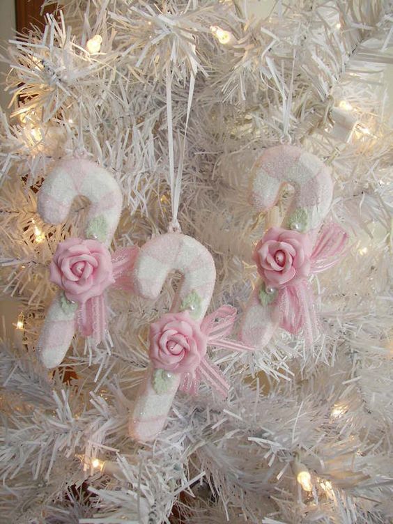 snowy candy canes with pink roses for ornaments