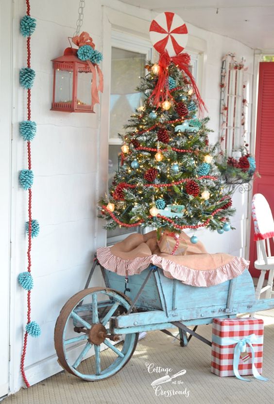 retro Christmas tree with red and aqua decor for a shabby chic porch