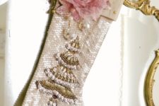 27 shabby chic embellished stocking with a beaded tree and a pink flower