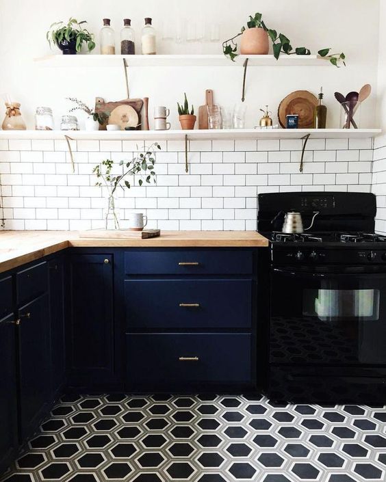 geometric honeycomb floor tiles fit navy cabinets