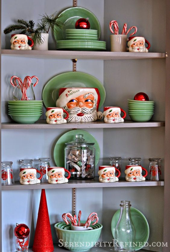 green dishes and Santa mugs for a retro kitchen display