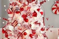 30 white tree with red ornaments and candy swirls