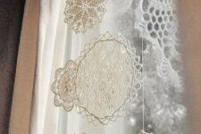 31 create snowflakes of doilies and hang them on the window