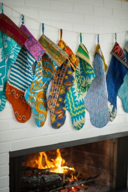 colorful boho chic stockings over the fireplace