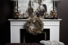 34 metallic Christmas ornaments in cloches and a metallic wreath