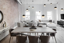 01 This modern industrial loft is decorated in calm and peaceful shades like light grey and taupe
