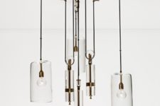 02 The chandelier is a cool industrial piece of glass and metal, its a little asymmetrical design catches an eye