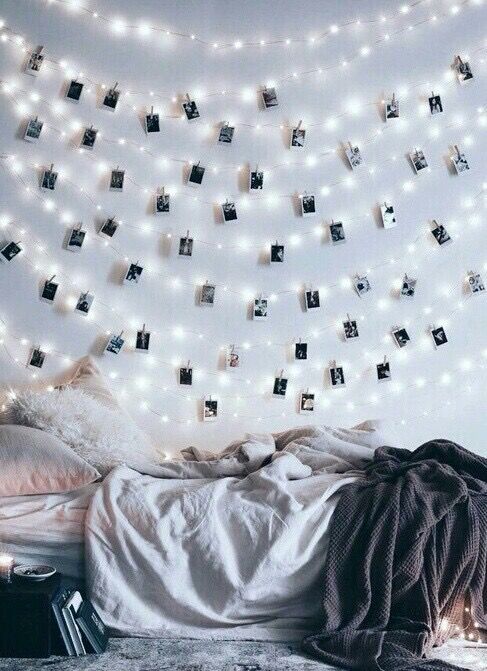 lots of string lights with Polaroids will personalize your room and make it glam