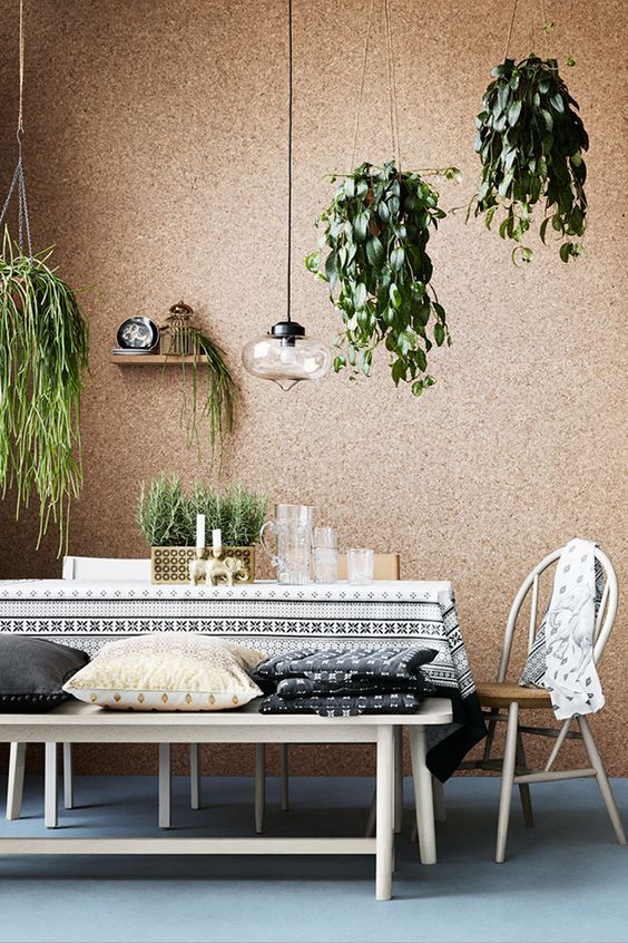 a cork covered wall looks cool and textural, besides it's great for sound-proofing