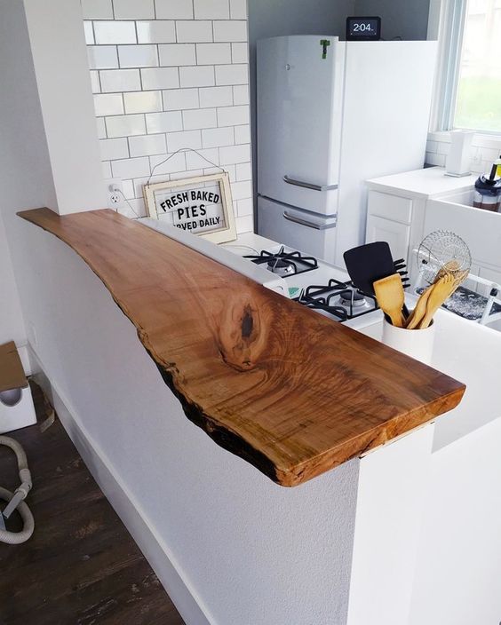 this small raw wood edge countertop gives a feeling of natural wood and looks chic