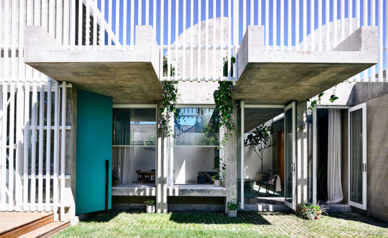 A white aluminum screen wraps around the house