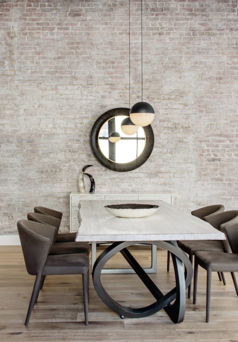 Some dark accents like furniture legs, lamps and a mirror frame make the space more stylish and highlight it Some dark accents like furniture legs, lamps and a mirror frame make the space more stylish and highlight it