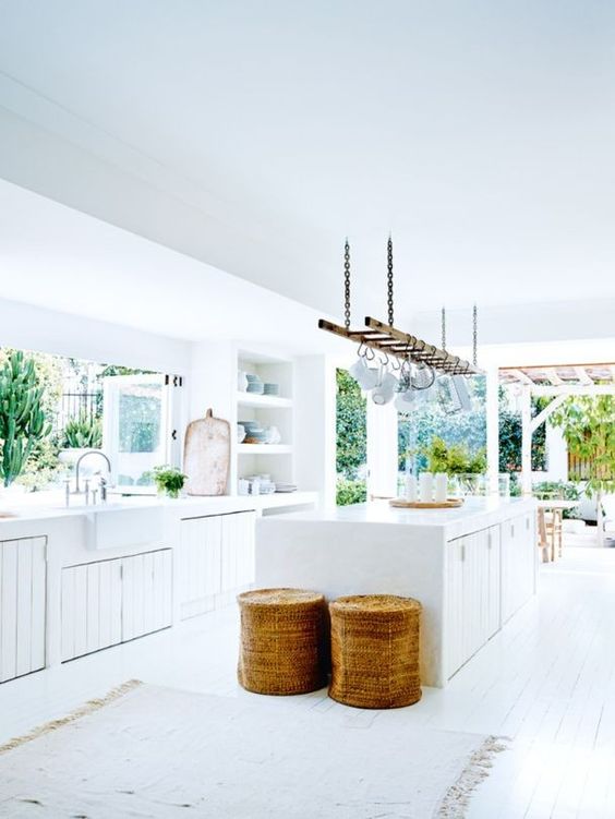 The kitchen has a strong connection with outdoor and indoor zones as the owner is a keen cook who likes parties and cookings for friends The kitchen has a strong connection with outdoor and indoor zones as the owner is a keen cook who likes parties and cookings for friends