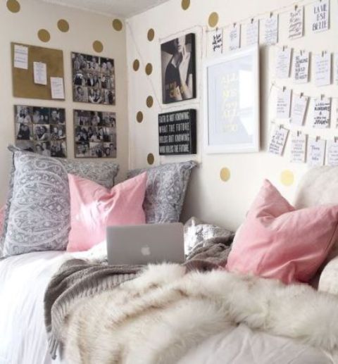 gold polka dots on the walls and pink pillows will add a glam feeling