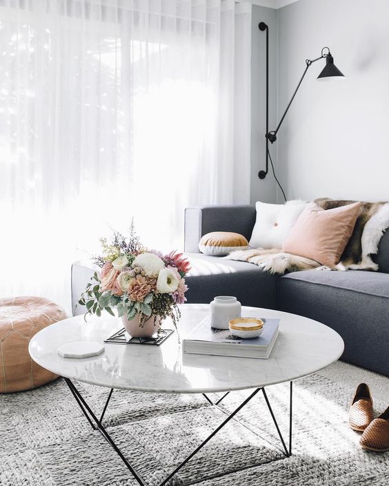 grey knit rug with different patterns can easily spruce up any room without being too much