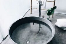 04 round concrete bathtub has a luxury feel