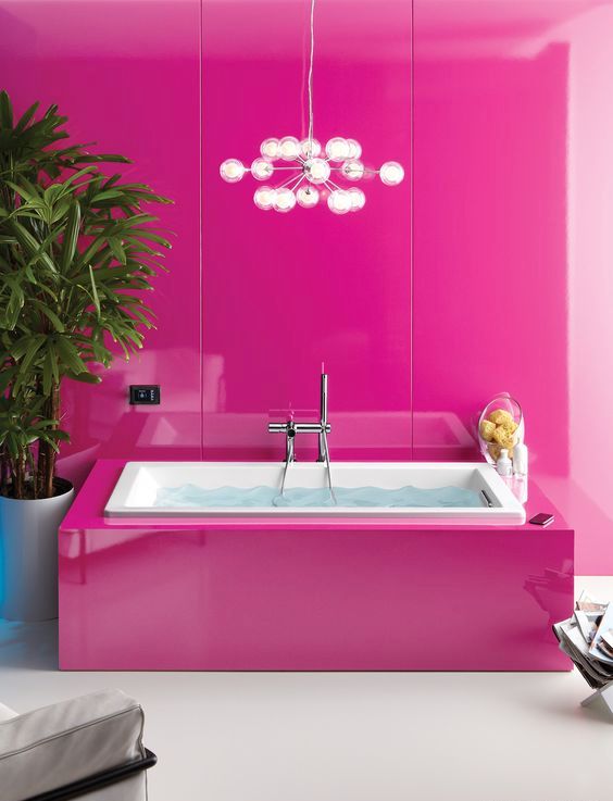 modern girl's bathroom, walls and the bathtub covered with fuchsia panels