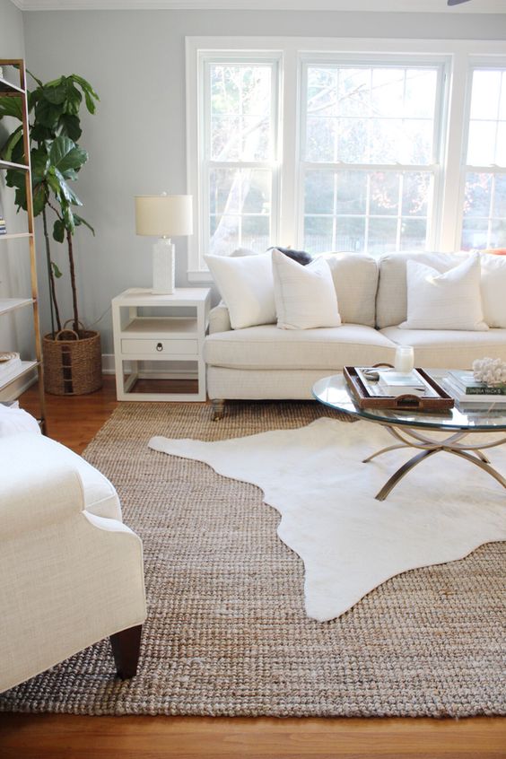 rug layering is a great idea for any room, pick two different colors and textures
